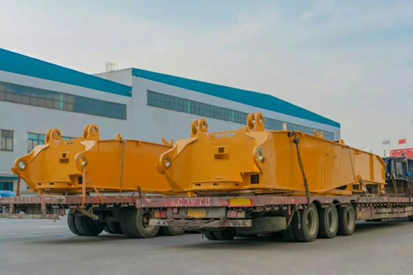 Large track frames for excavator shipping