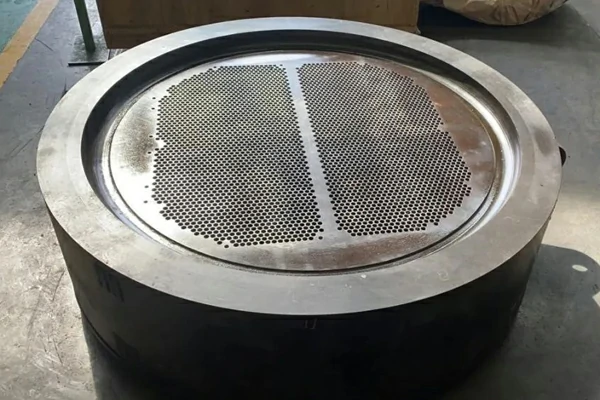 Custom surfacing tube sheet
